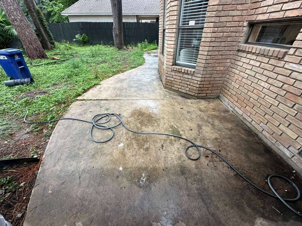 Stained concrete walkway before epoxy