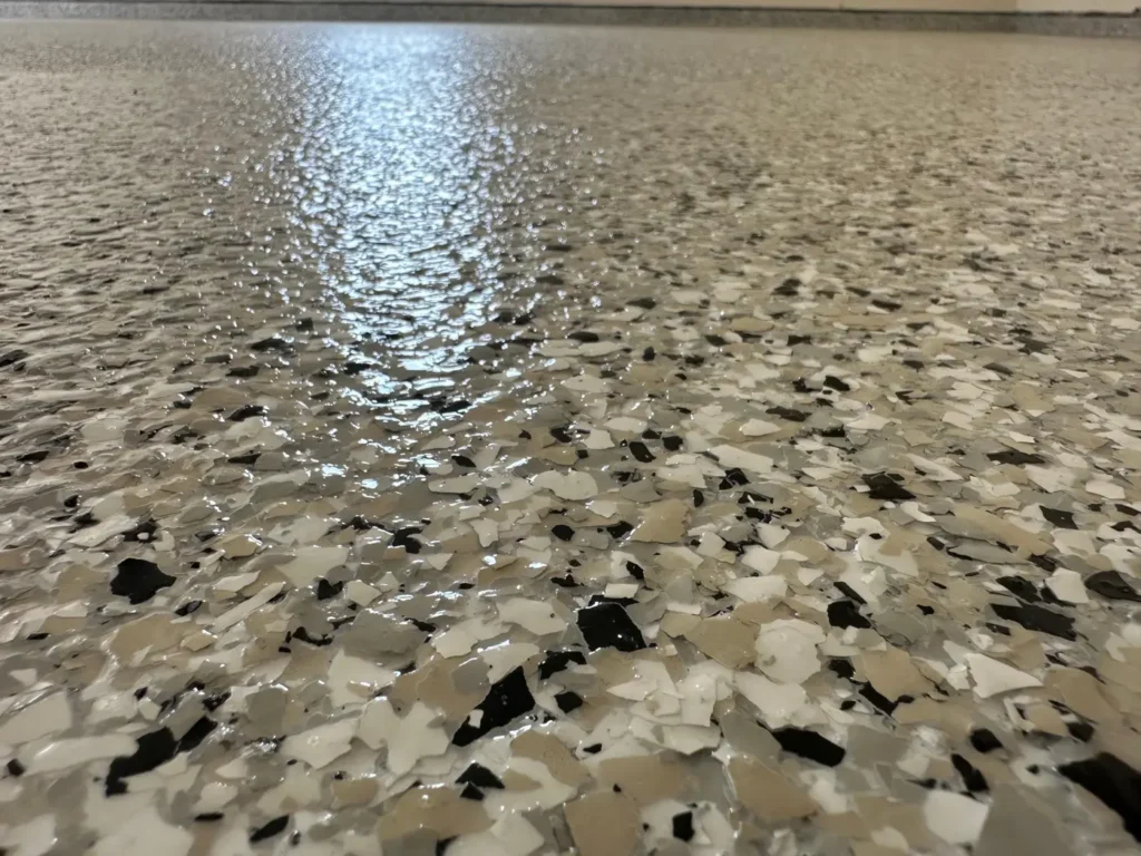 Close-up of epoxy flake blend on a Texan Epoxy Company floor